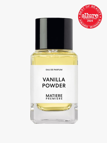 parfum in branded clear bottle with black cap on light gray background with red and white 2024 allure best of beauty seal